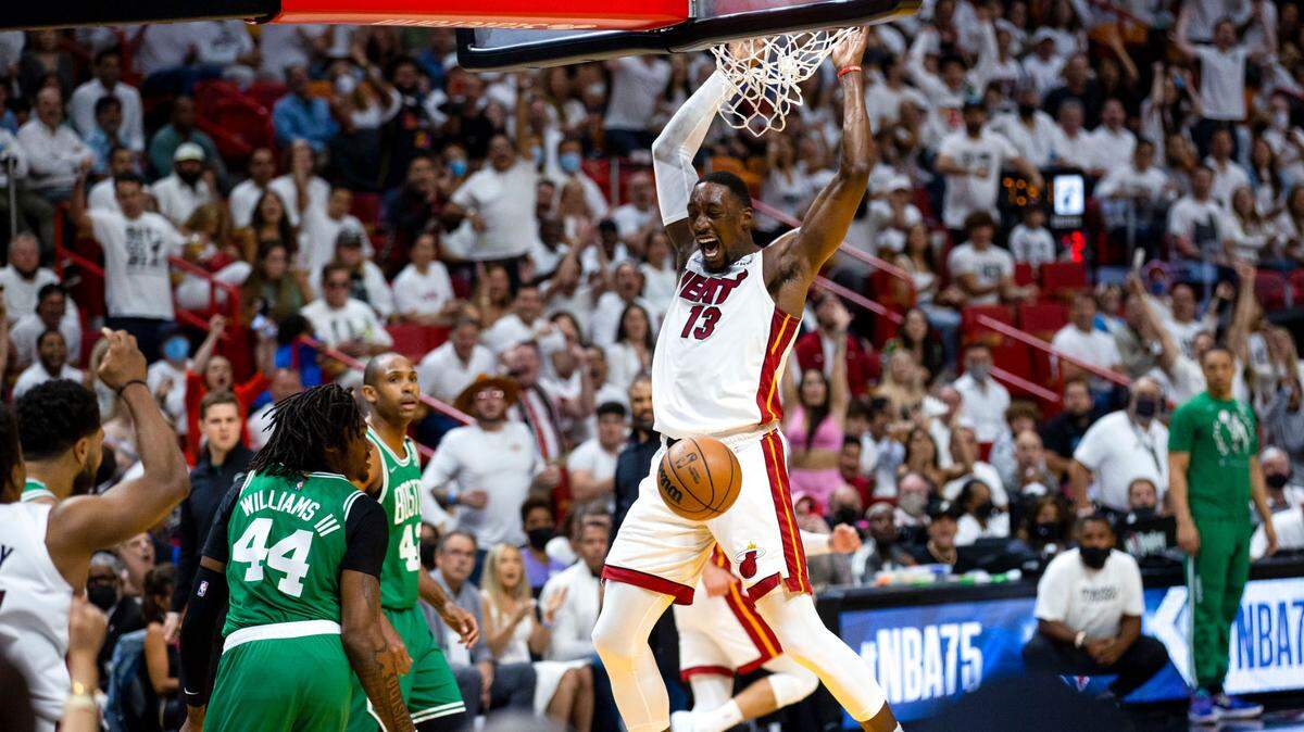 Miami Heat center Bam Adebayo (22) dunks the ball over Boston Celtics center Robert Williams III (44) during the first quarter of Game 7 of the NBA Eastern Conference Finals series in Miami, Florida, on Sunday, May 29, 2022.