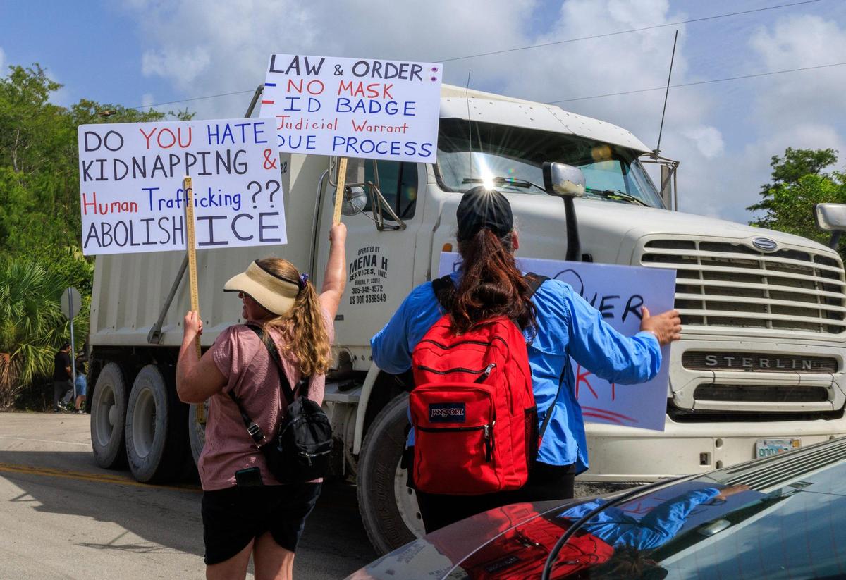 Protesters shouted to trucks entering the Dade-Collier Training and Transition Airport during the “Stop Alligator Alcatraz” protest in opposition to the construction of a massive detention facility for undocumented immigrants on the site, which is in the middle of the Florida Everglades, in Ochopee, Florida, on Saturday June 28, 2025.
