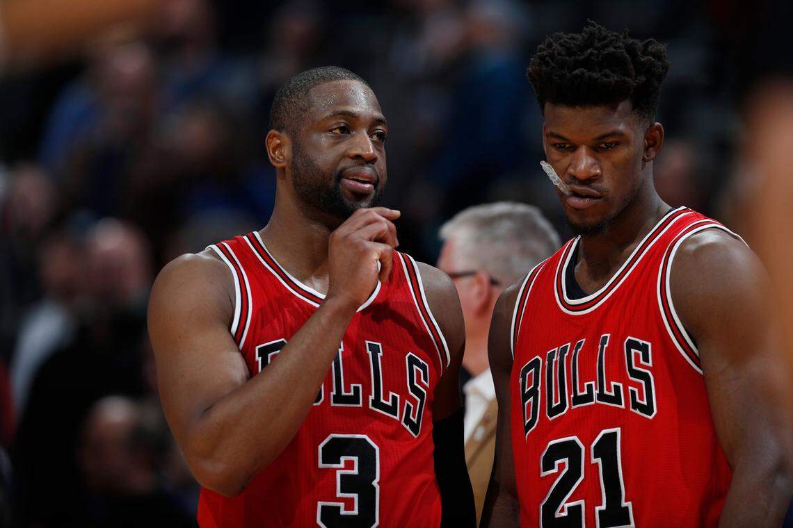 Chicago Bulls guard Dwyane Wade (3) and Chicago Bulls forward Jimmy Butler (21) in the second half of an NBA basketball game Tuesday, Nov. 22, 2016, in Denver. The Nuggets won 110-107.