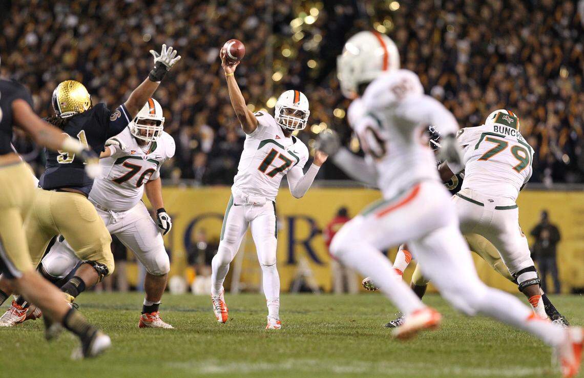 Stephen Morris passes in the third quarter of the University of Miami game against Notre Dame at Soldier Field in Chicago in 2012. Notre Dame beat Miami 41-3.