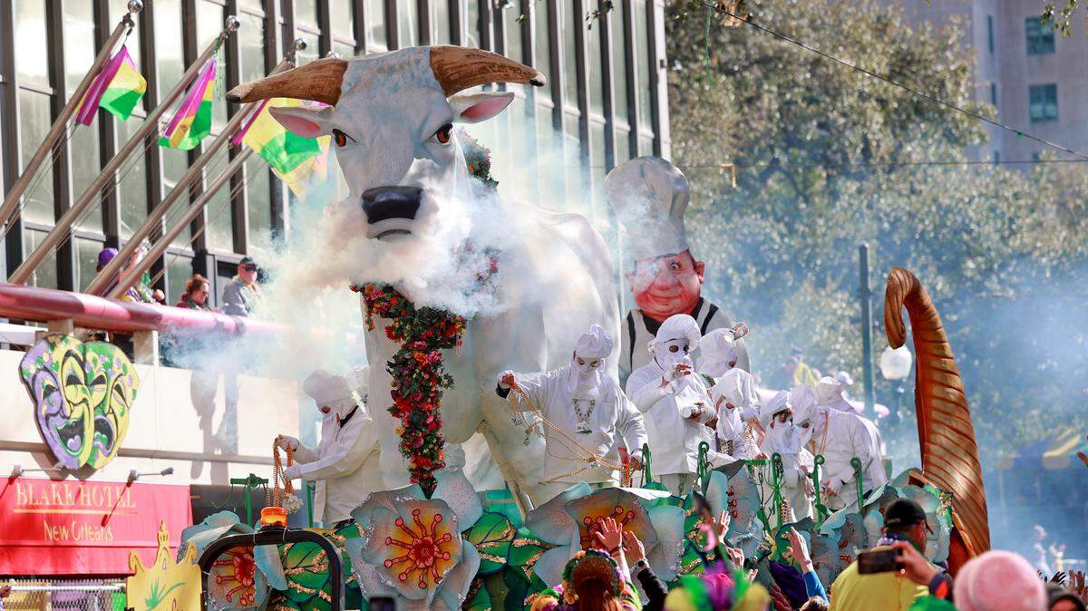 The Boeuf Gras float rolls down St. Charles Avenue on Mardi Gras Day as the 440 riders of Rex, King of Carnival, present their 29-float parade entitled “The Two Worlds of Lafcadio Hearn” on February 13, 2024 in New Orleans, Louisiana.
