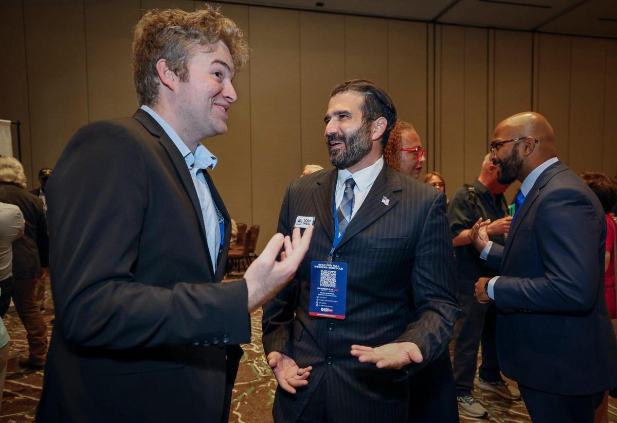 Josh McMillan, at left, speaks with Josh Weil, candidate for US Senate, during the Florida Democratic Party annual Leadership Blue Gala at the Hard Rock Hotel and Casino in Hollywood, Florida on Saturday, June 21, 2025.