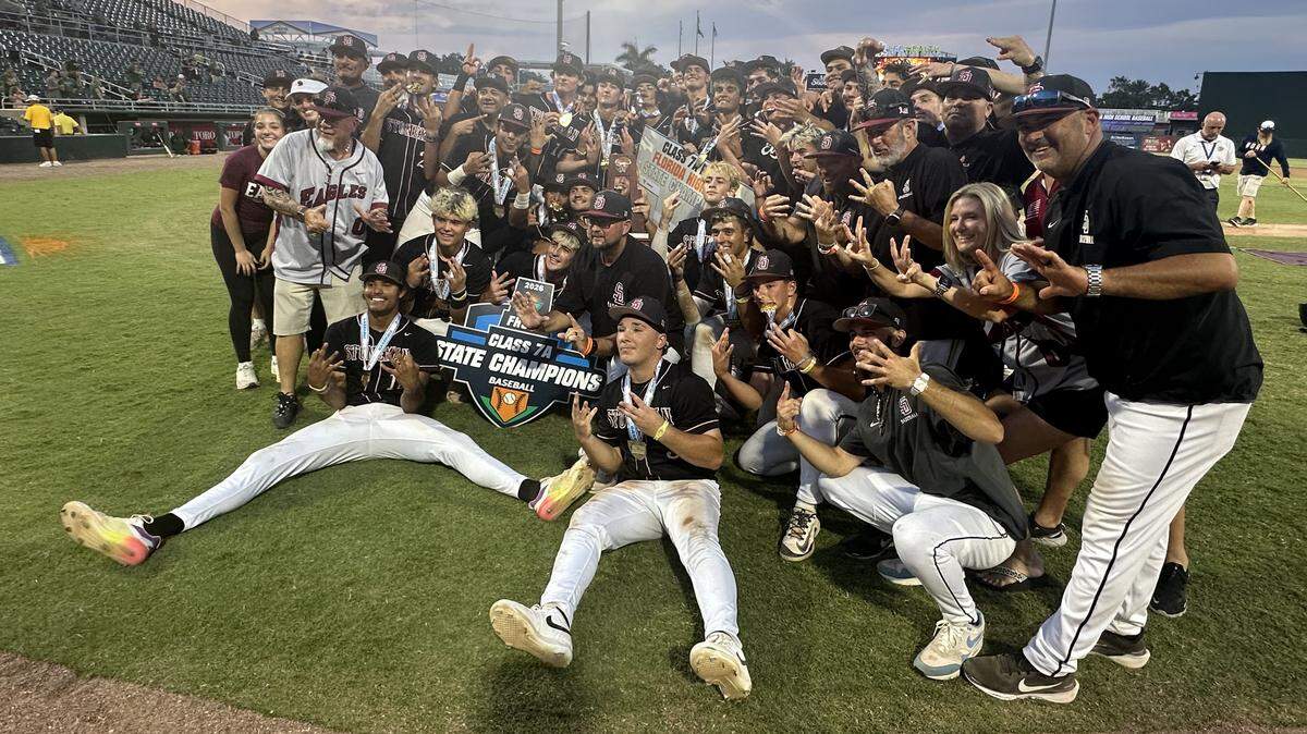 The Stoneman Douglas baseball team celebrates after beating Venice 2-1 on Saturday night to win the Class 7A state championship at Hammond Stadium in Fort Myers, Fla.
