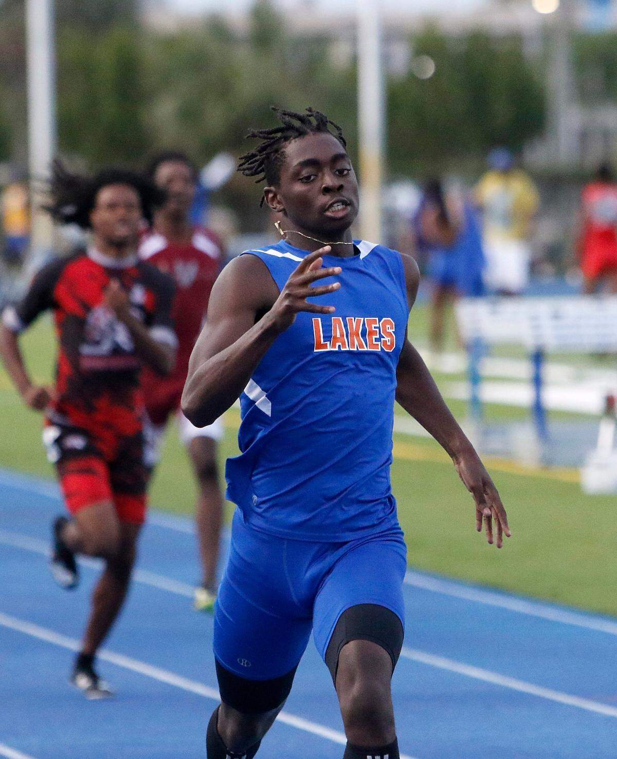 Hialeah-Miami Lakes’ Mekhi Gammons finishes first the boys 400 meter dash during the GMAC Track and Field Championship on Thursday, April 7, 2022 at Traz Powell Stadium in Miami. Andrew Uloza / for THE MIAMI HERALD
