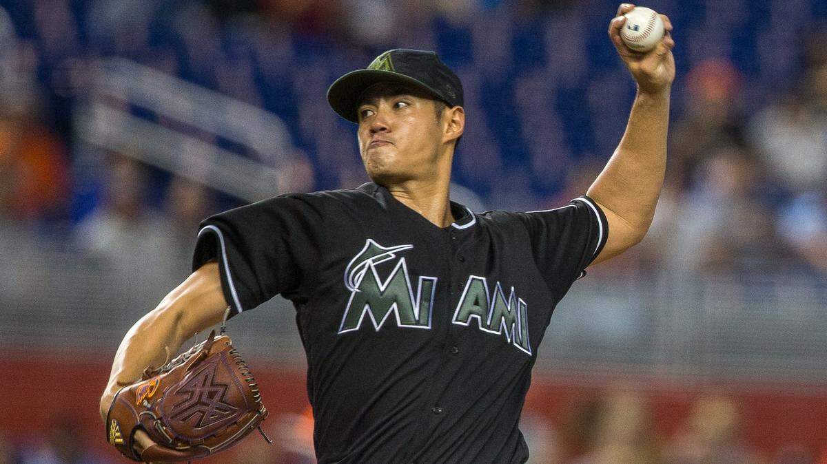 Miami Marlins starting pitcher Wei-Yin Chen (54) faces Washington Nationals shortstop Trea Turner (7) during the first inning of the game at Marlins Park in Miami on Saturday, May 26, 2018.
