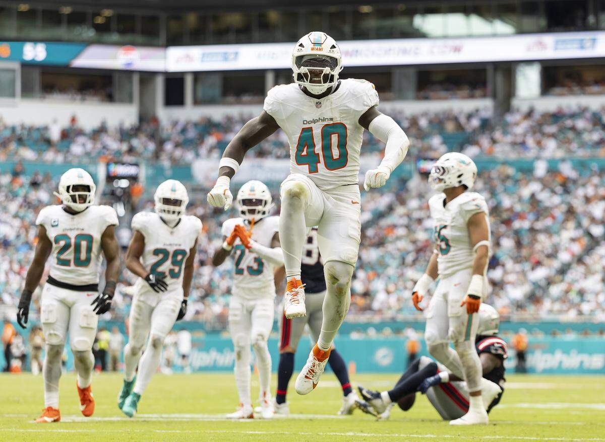 Miami Dolphins linebacker Willie Gay Jr. (40) celebrates after a play against the New England Patriots in the second half of their NFL game at Hard Rock Stadium on Sunday, Sept. 14, 2025, in Miami Gardens, Fla.