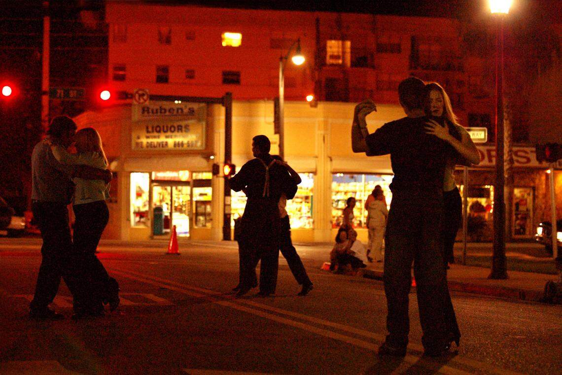 Dancers participate in “Tango in the Street” in 2002 at the Normandy Village Fountain Plaza.