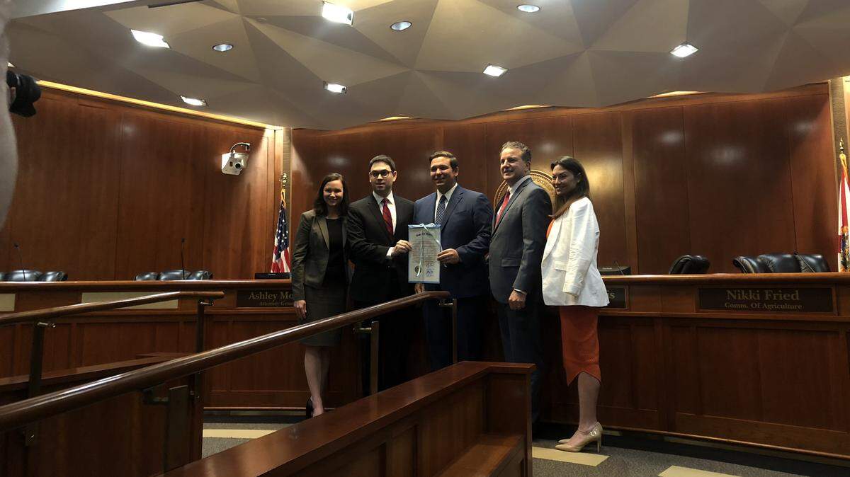 Attorney General Ashley Moody, Deputy Consul General Guy Gilady from the Consulate General of Israel in Miami, Chief Financial Officer Jimmy Patronis and Agriculture Commissioner Nikki Fried pose for a photo before the Florida Cabinet meeting on Jan. 29, 2018.