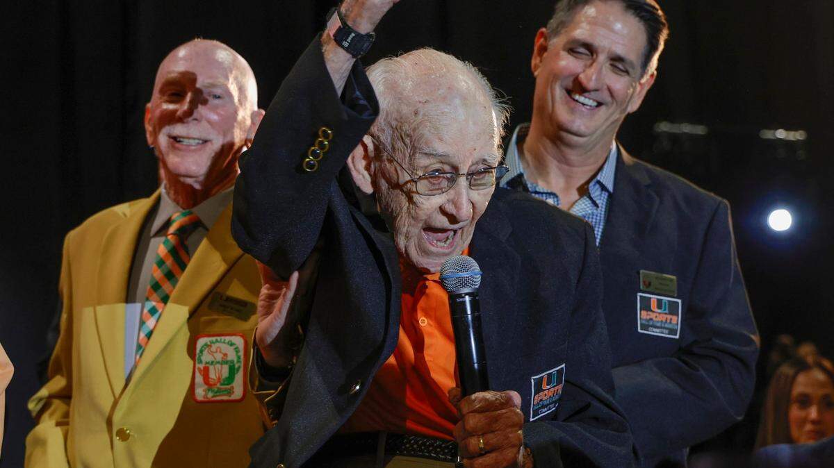 G. Holmes Braddock, 98, reacts as he is honored during the University of Miami’s Sports Hall of Fame & Museum 54th Induction Banquet on campus at the Watsco Center in Coral Gables, Florida on Thursday, April 18, 2024.