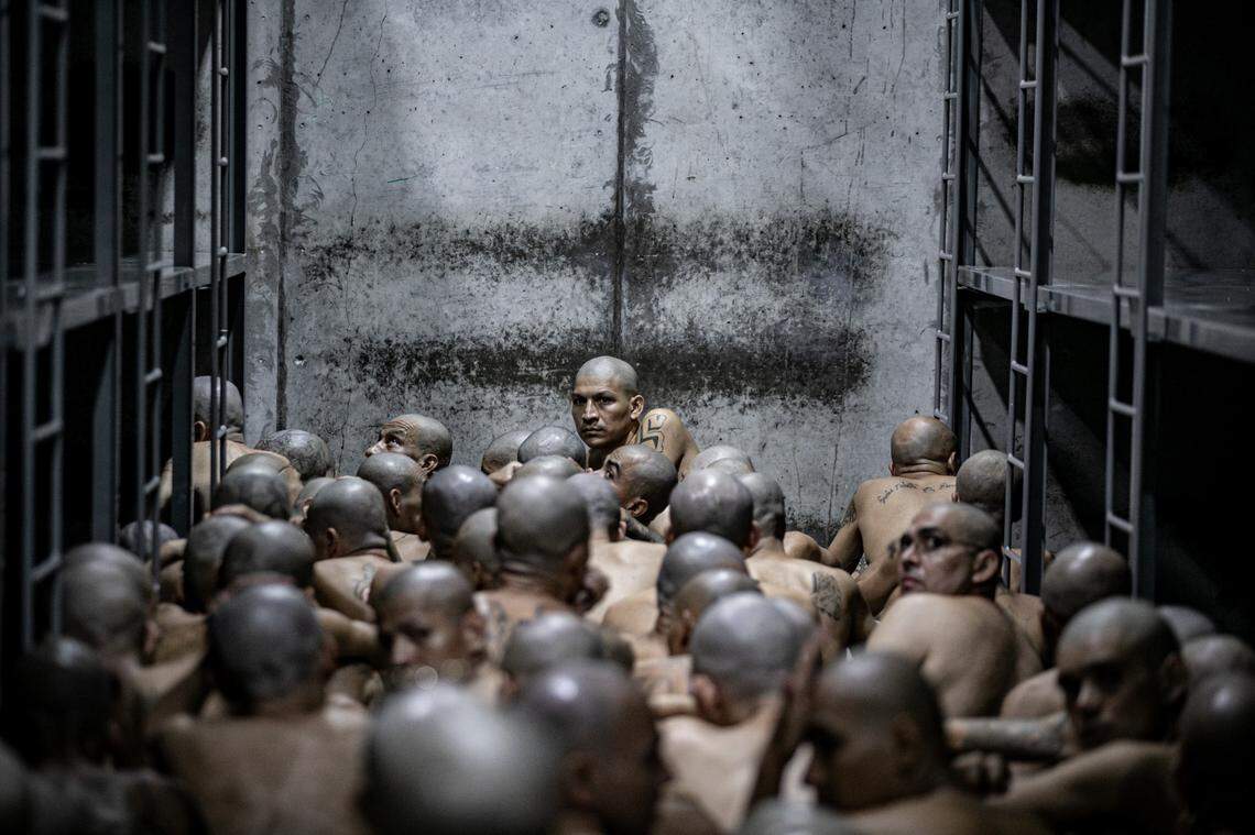 In this handout picture provided by the Salvadoran presidency, inmates wait as 2,000 detainees are moved to mega- prison Terrorist Confinement Centre (CECOT) on June 11, 2024 in Tecoluca, El Salvador. (Photo by Handout/Presidencia El Salvador via Getty Images )
