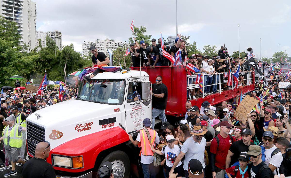 Ricky Martin, alongside Residente, Bad Bunny and other celebrities, joins with thousands of Puerto Ricans marching on Las Américas expressway calling for Gov. Ricardo “Ricky” Rosselló to resign following the leaked of private chats. The massive protest was Monday, July 22, 2019.