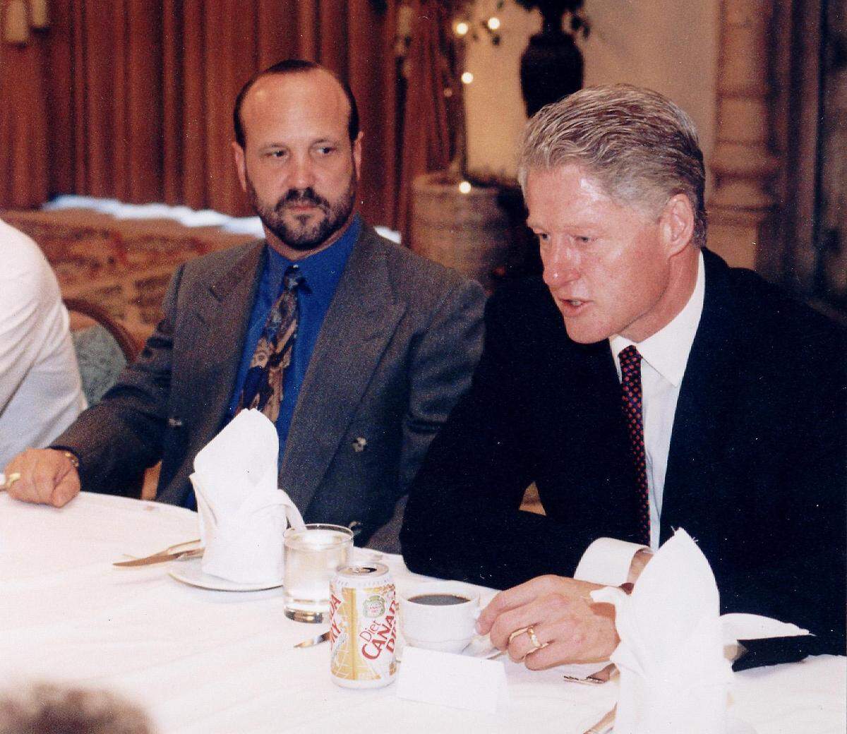 Ron Book and former President Bill Clinton.