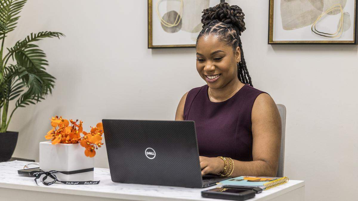 Kerrina O'Connor, a tax professional with Kake Financial Services & Taxes LLC, works in her office in Lauderhill, Florida, on Friday, February 13, 2026.