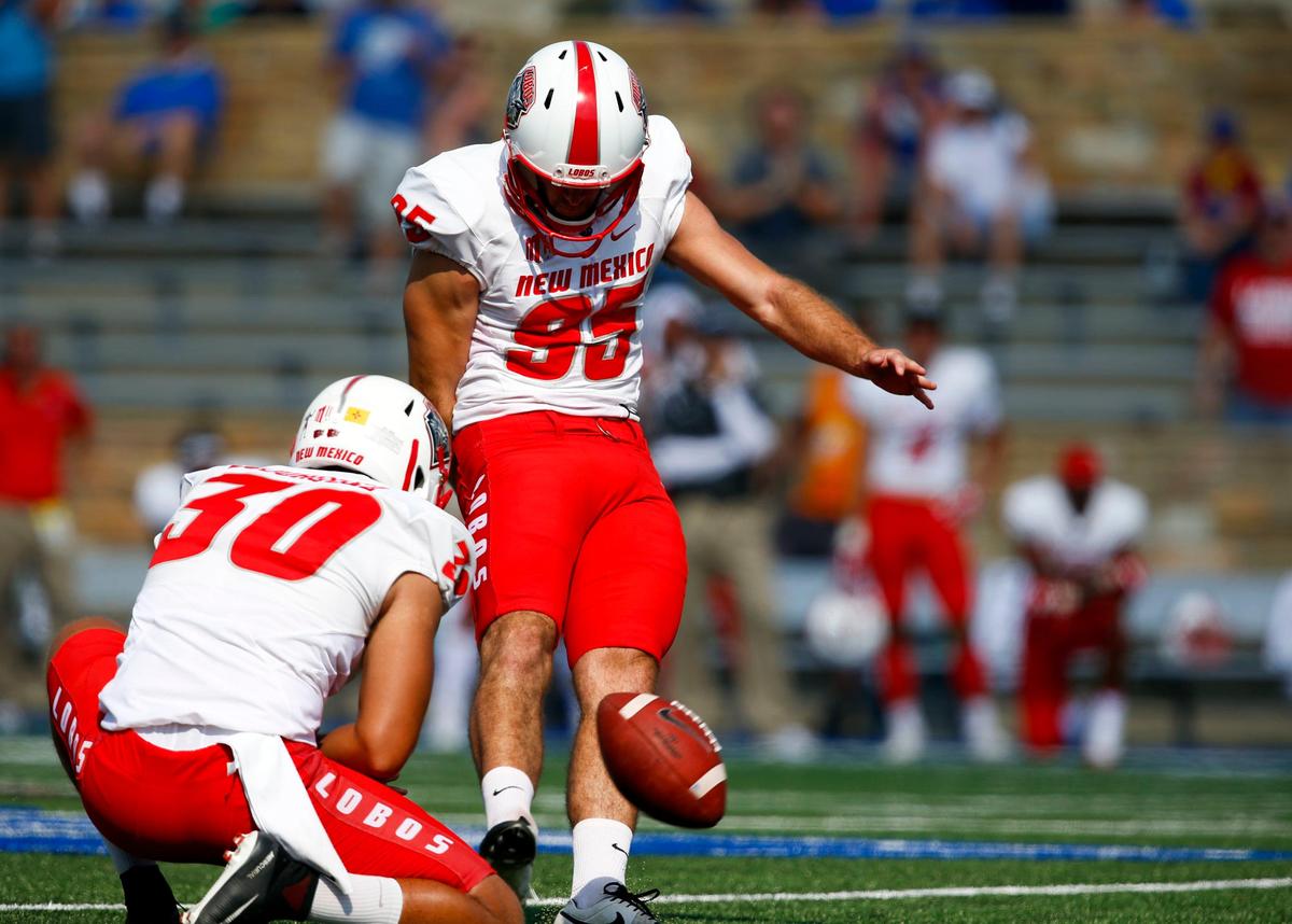 New Mexico's Jason Sanders, right, kicks a field goal against Tulsa in the second half  of an NCAA college football game at H.A. Chapman Stadium in Tulsa, Okla., Saturday, Sept. 23, 2017.