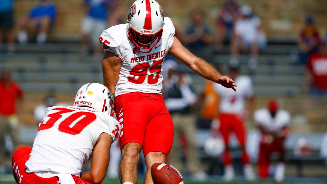 New Mexico's Jason Sanders, right, kicks a field goal against Tulsa in the second half  of an NCAA college football game at H.A. Chapman Stadium in Tulsa, Okla., Saturday, Sept. 23, 2017.