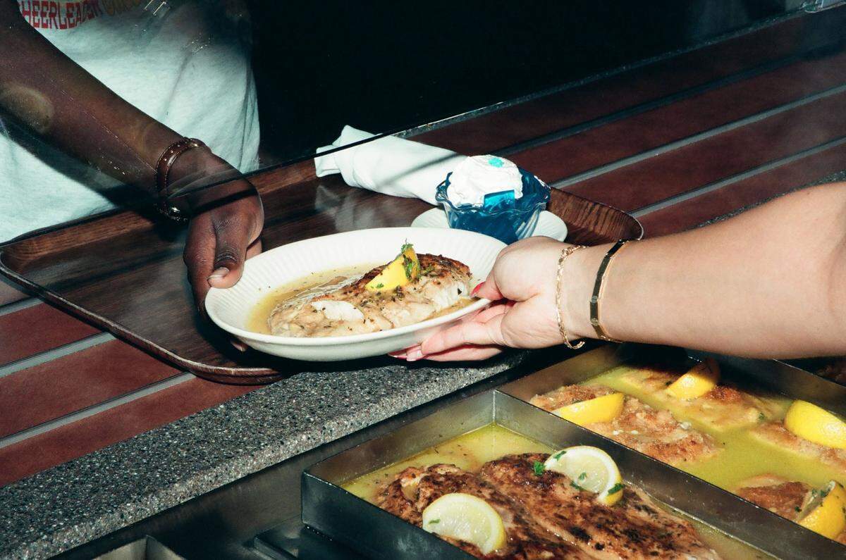 Serving up a blue plate special at the Picadilly Cafeteria.