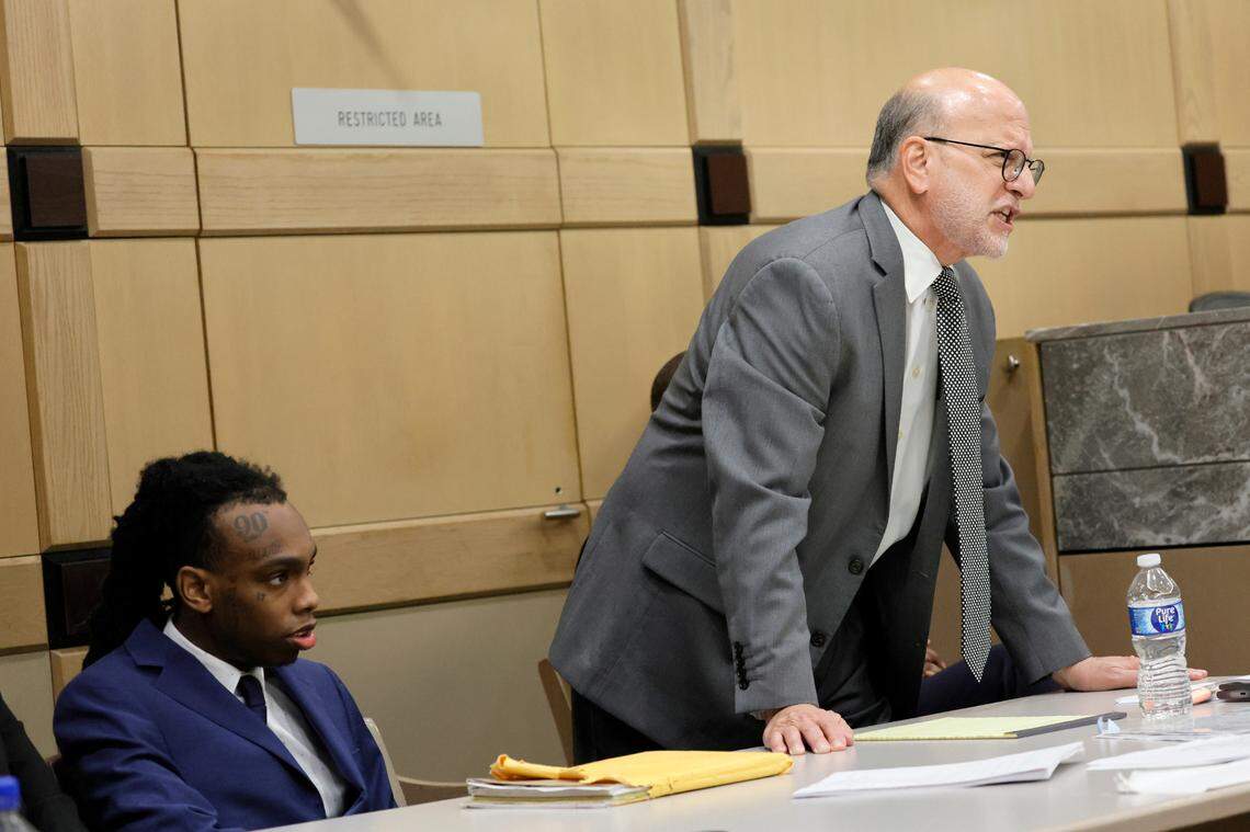Defense attorney Stuart Adelstein, with Jamell Demons, better known as rapper YNW Melly, at left, gives his closing argument in his trial at the Broward County Courthouse in Fort Lauderdale on Thursday, July 20, 2023. Demons, 22, is accused of killing two fellow rappers and conspiring to make it look like a drive-by shooting in October 2018. (Amy Beth Bennett / South Florida Sun Sentinel)