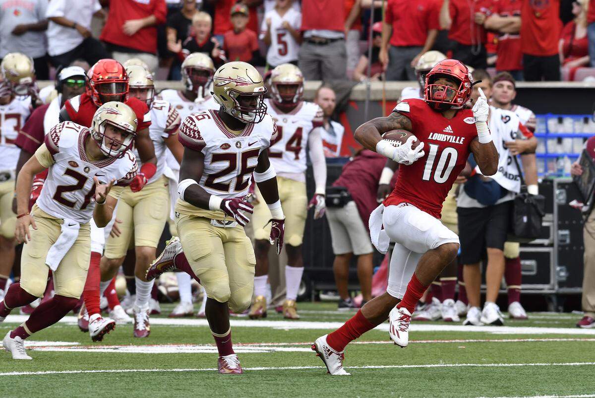 Louisville cornerback Jaire Alexander (10) looks back at his Florida State pursuers during the second half of an NCAA college football game Sat., Sep. 17, 2016, in Louisville Ky. Louisville won 63-20.