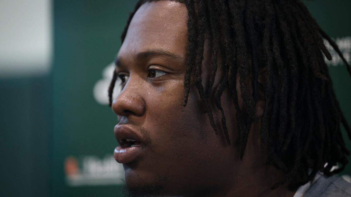 Hurricanes defensive lineman Branson Deen (58) talks to the press after the University of Miami Hurricanes football practice on Tuesday, March 21, 2023, on campus in Coral Gables. Deen transferred from Purdue in January.