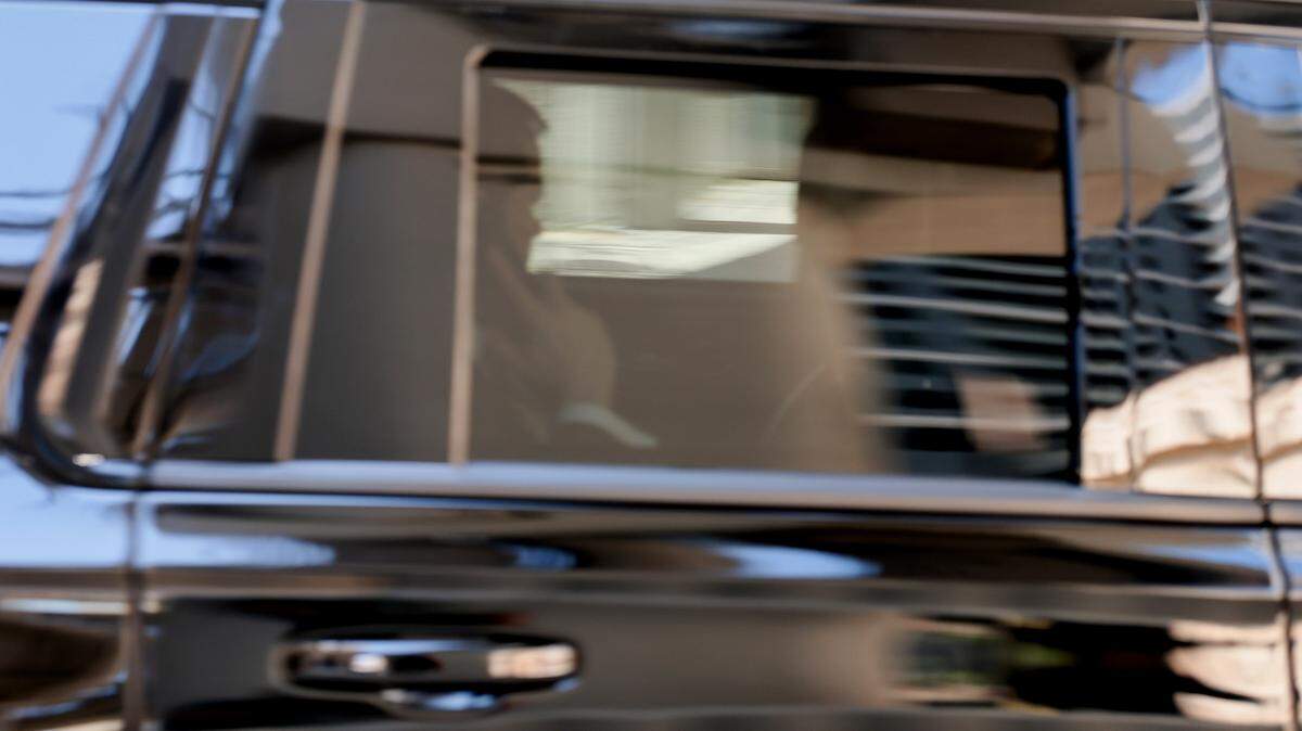 Secretary of State Marco Rubio speaks on a phone as he leaves the James Lawrence King Federal Justice Building on March 24, 2026, in Miami. 