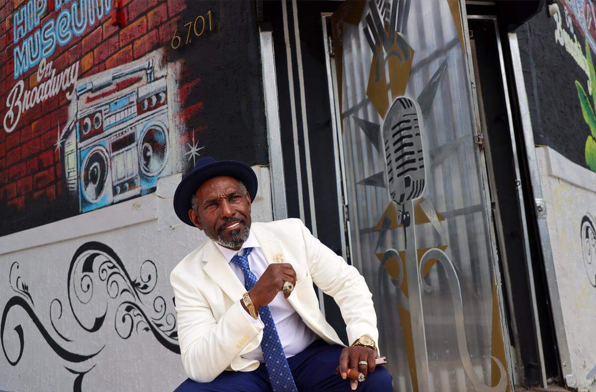 Liberty City native Cuthbert Broadway Harewood, Jr., the designated 2026 grand marshal of the MLK Jr., sits outside the 305 Hip Hop Museum that he co-owns and co-operates on Thursday, January 8, 2026, in Miami, Florida.  The museum is a cultural landmark dedicated to preserving, celebrating, and showcasing Miami's rich and distinctive hip-hop heritage, represented by the “305” area code.