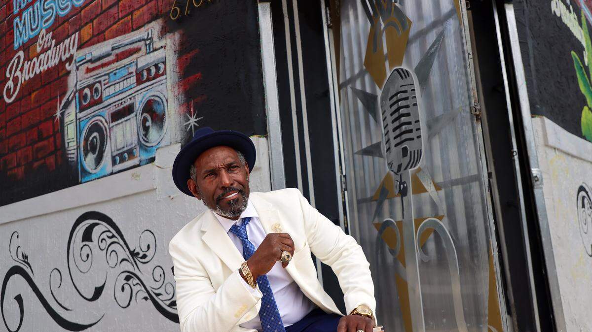 Liberty City native Cuthbert Broadway Harewood, Jr., the designated 2026 grand marshal of the MLK Jr., sits outside the 305 Hip Hop Museum that he co-owns and co-operates on Thursday, January 8, 2026, in Miami, Florida. The museum is a cultural landmark dedicated to preserving, celebrating, and showcasing Miami's rich and distinctive hip-hop heritage, represented by the “305” area code.