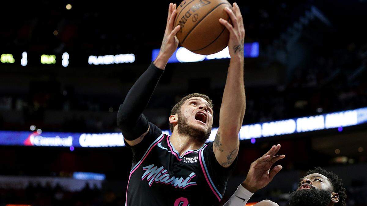 Miami Heat guard Tyler Johnson goes up to the basket against Pacers guard Tyreke Evans in the first quarter of the Miami Heat vs Indiana Pacers, at AmericanAirlines Arena in Miami on Friday, Nov. 9, 2018.