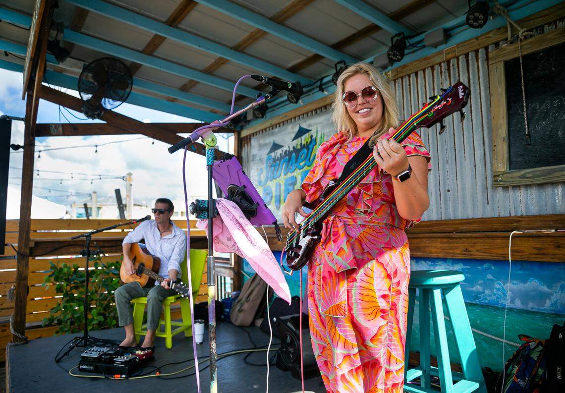 Claire Finley and John Williams perform at Sunset Pier in Key West, Florida on Saturday, December 11, 2021.