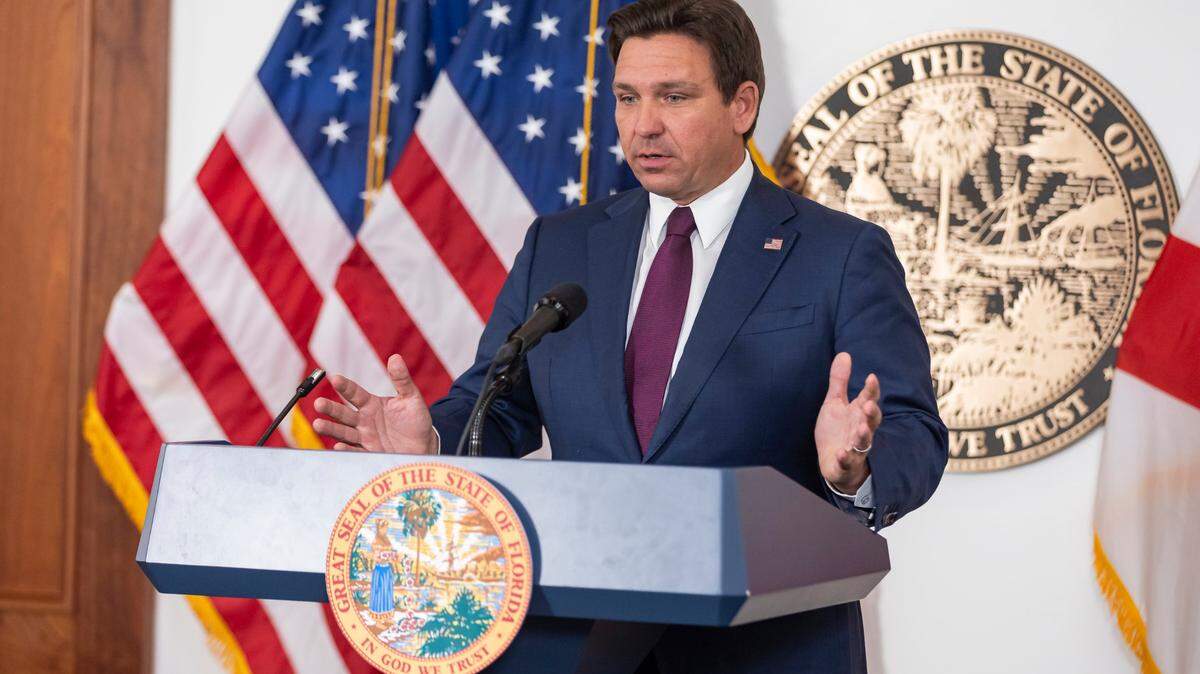 Florida Gov. Ron DeSantis speaks with reporters at the Florida State Capitol on March 4, 2025, in Tallahassee