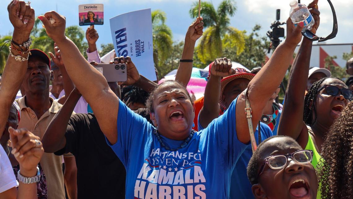 Pembroke Pines resident Audi Sicard of the Broward DNC board, center, joins in support of the South Florida Haitian community as Miami-Dade Democratic Haitian Caucus hosted a rally against the rhetoric of former President Donald Trump and running mate J.D. Vance, the importance of registration to vote, and participation in the election this November 5th on Sunday, September 22, 2024, in North Miami, Florida.