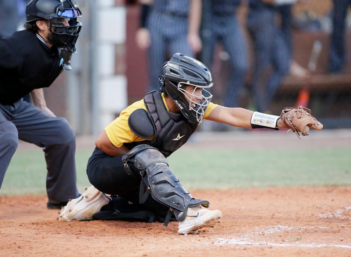 American Heritage Patriots catcher Sebastian Garavito catches the ball during regional semifinal baseball game against Mater Academy Lions on Friday, May 10, 2024 at American Heritage HS in Plantation. Andrew Uloza / for Miami Herald