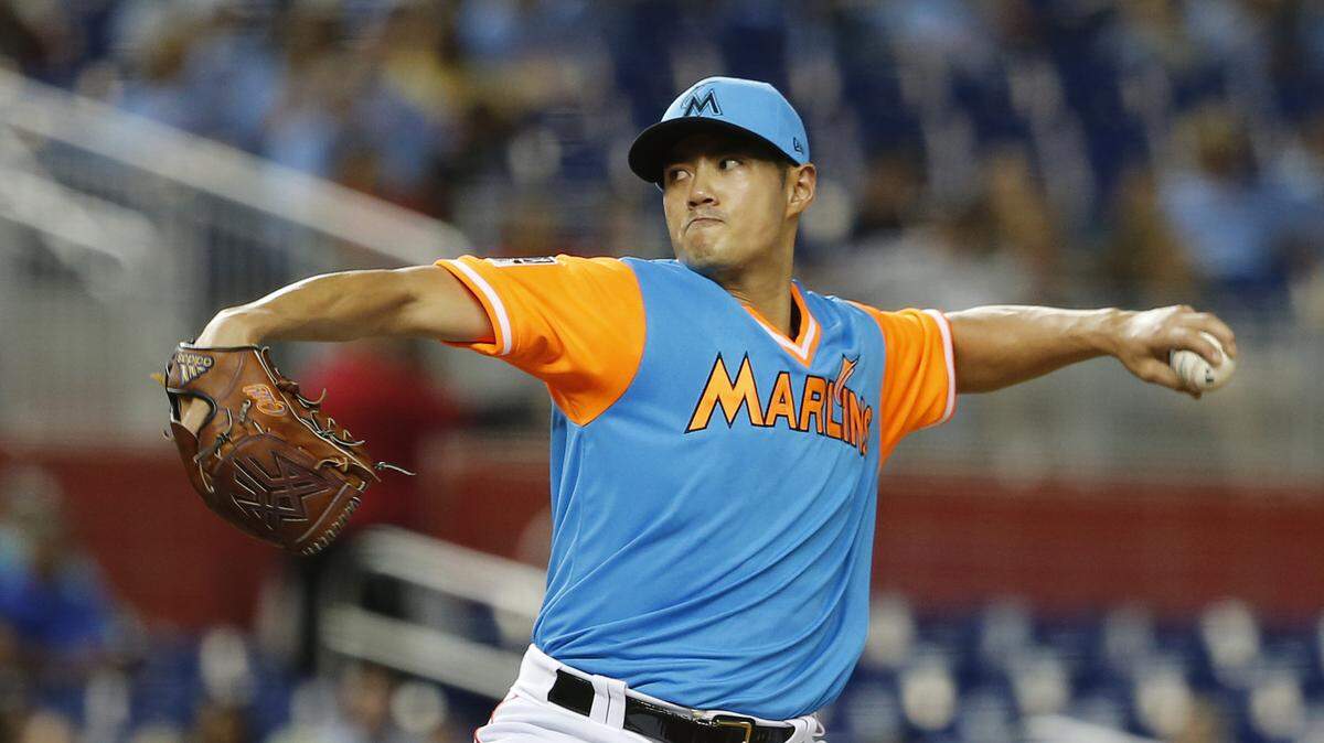 Miami Marlins starting pitcher Wei-Yin Chen throws against the Atlanta Braves in the first inning of a baseball game in Miami, Saturday, Aug. 25, 2018. (AP Photo/Joe Skipper)