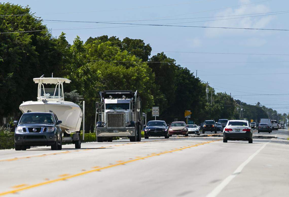 Cars make their way down the Overseas Highway near mile marker 81.5 in Islamorada, Florida on Monday, October 11, 2021.