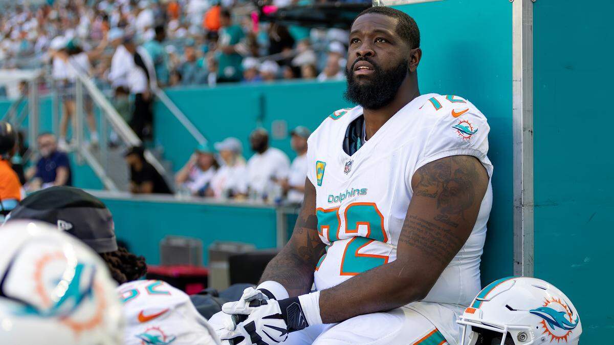 Miami Dolphins offensive tackle Terron Armstead (72) looks from the bench during the first half of their NFL game against the New York Jets at Hard Rock Stadium on Sunday, Dec. 8, 2024, in Miami Gardens, Florida.
