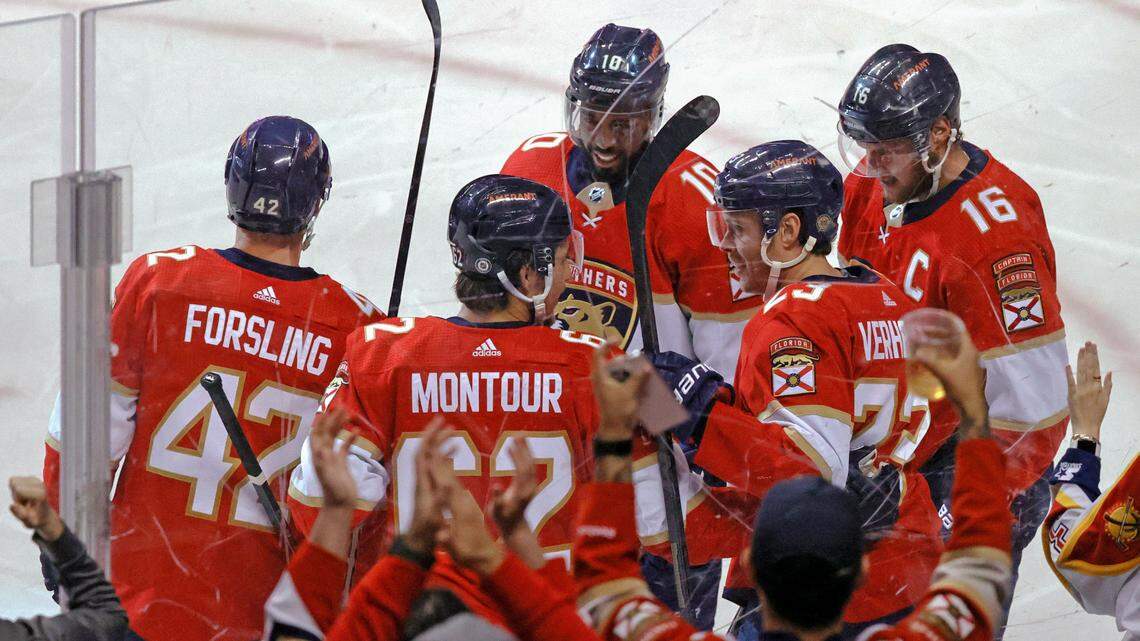 Florida Panthers center Carter Verhaeghe (23) is congratulated by teammates after scoring a goal against Dallas Stars during the second period of an NHL game at the FLA Live Arena on Friday, January 14, 2022 in Sunrise, Fl.