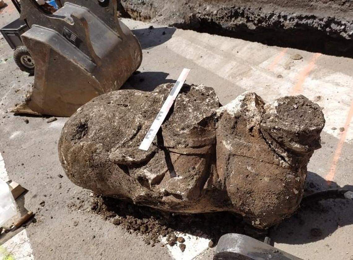 A large chunk of a horse and rider statue was pulled from the rubble, archaeologists said.