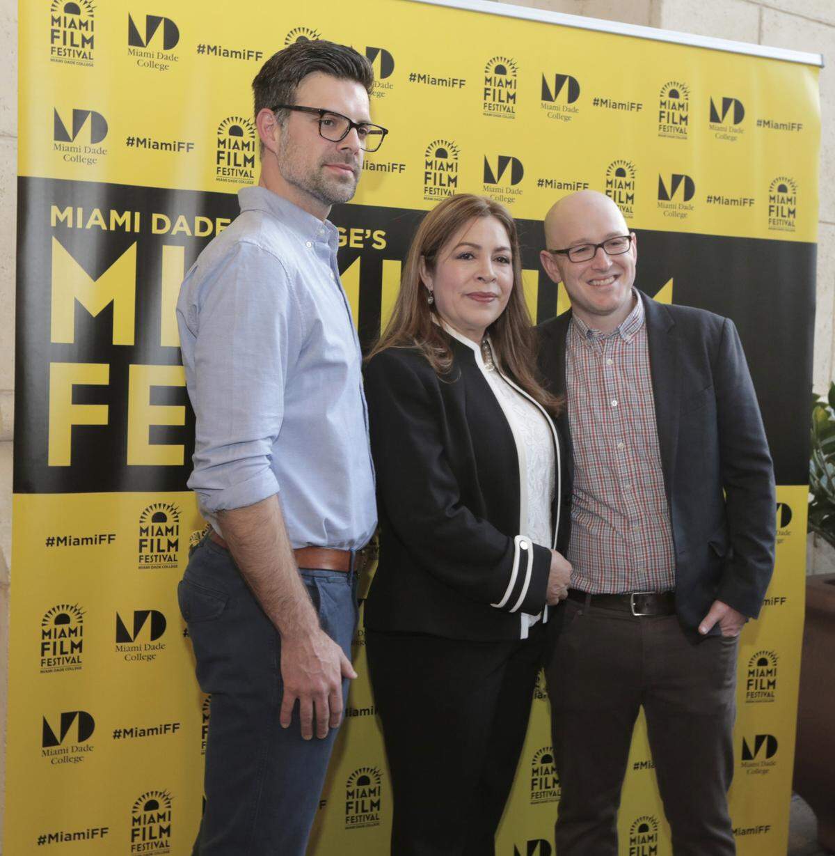 Directors Dave LaMattina (right), and Chad Walker (left) pose with Nora Sandigo (center) at the screening of “The Great Mother” at the Coral Gables Art Cinema. Sandigo serves as the legal guardian for more than 1,000 U.S.-born children of undocumented immigrants.