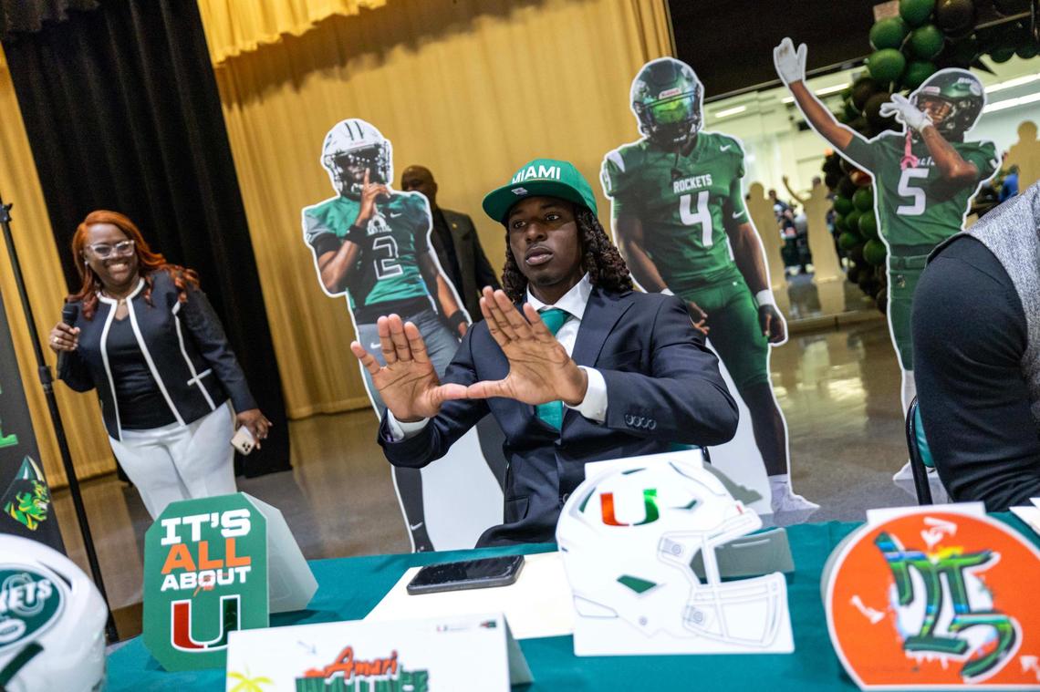 Miami Central’s Amari Wallace reacts after signing with University of Miami during signing day at Miami Central High School on Wednesday, Dec. 4, 2024, in Miami, Fla.