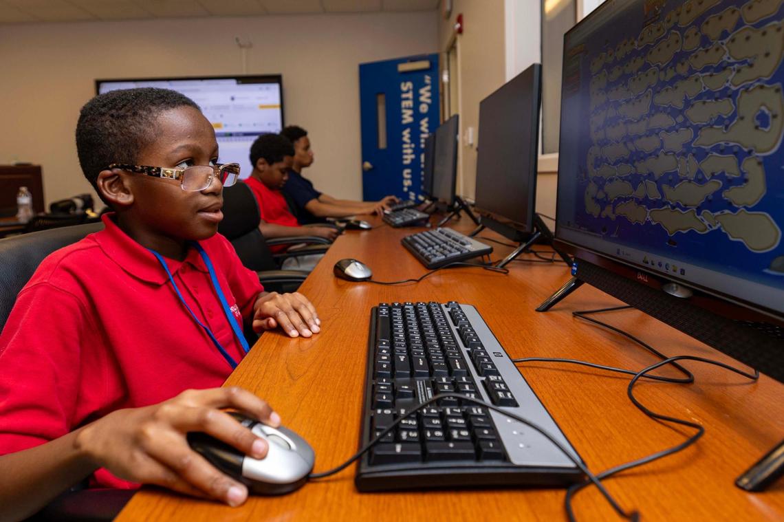 Evan Page, 10, plays ‘Code Combat’ during a ’Next Gen Coders’ workshop sponsored by Miami Gardens’ Department of Educational Development in partnership with Riley Technology Solutions at the Betty T. Ferguson Center, on Monday, January 13, 2025, in Miami Gardens, Fla.