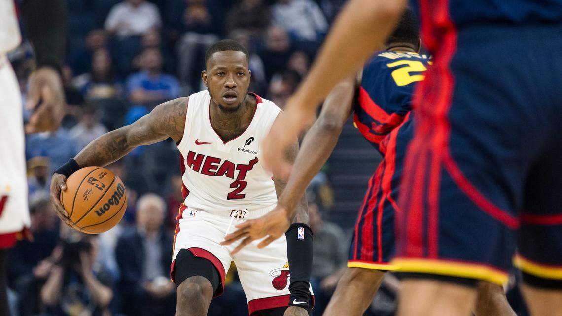 Miami Heat guard Terry Rozier (2) dribbles against the Golden State Warriors during the first quarter at Chase Center.