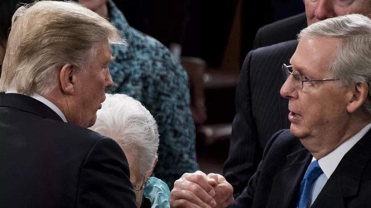 Senate Majority Leader Mitch McConnell, right, is one of President Trump’s most powerful supporters.
