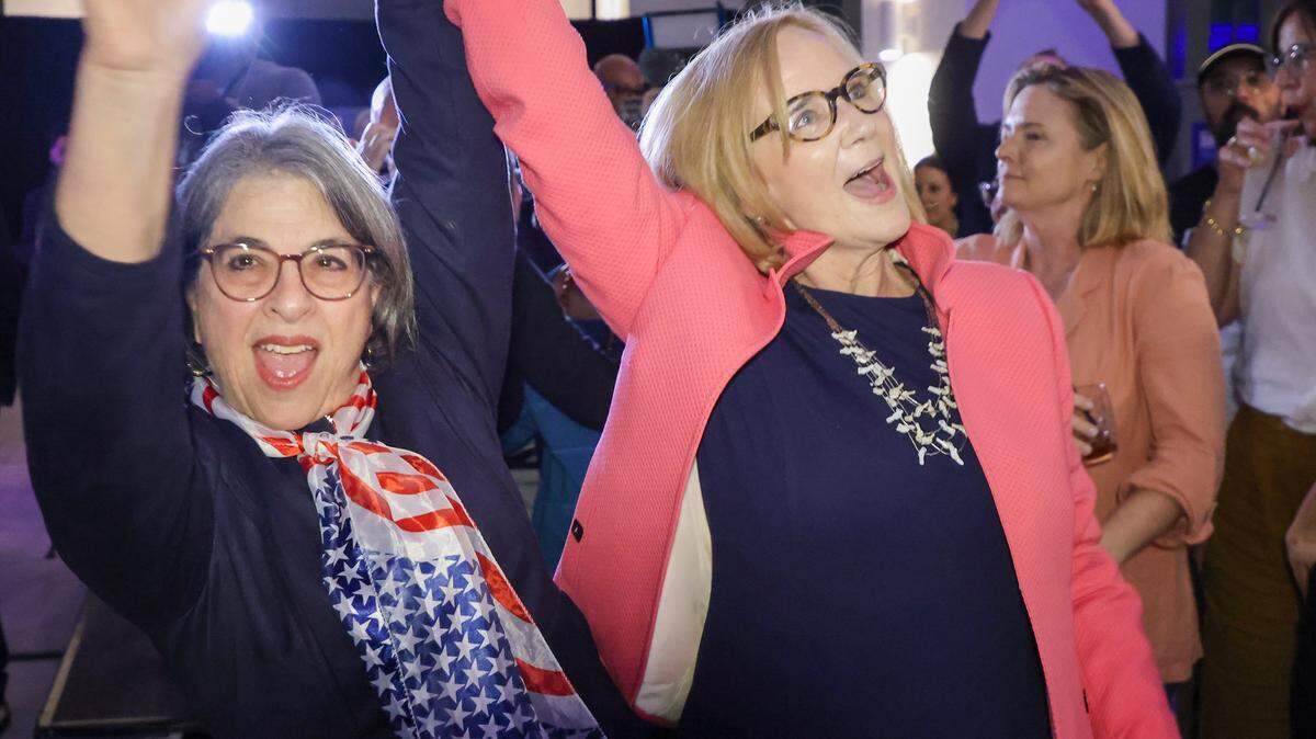 Miami-Dade Daniella Levine Cava, left, and mayoral candidate Eileen Higgins, right, celebrate as Higgins advance to a runoff during her election watch party at the Yotel in downtown Miami, Florida on election night Tuesday, November 4, 2025.