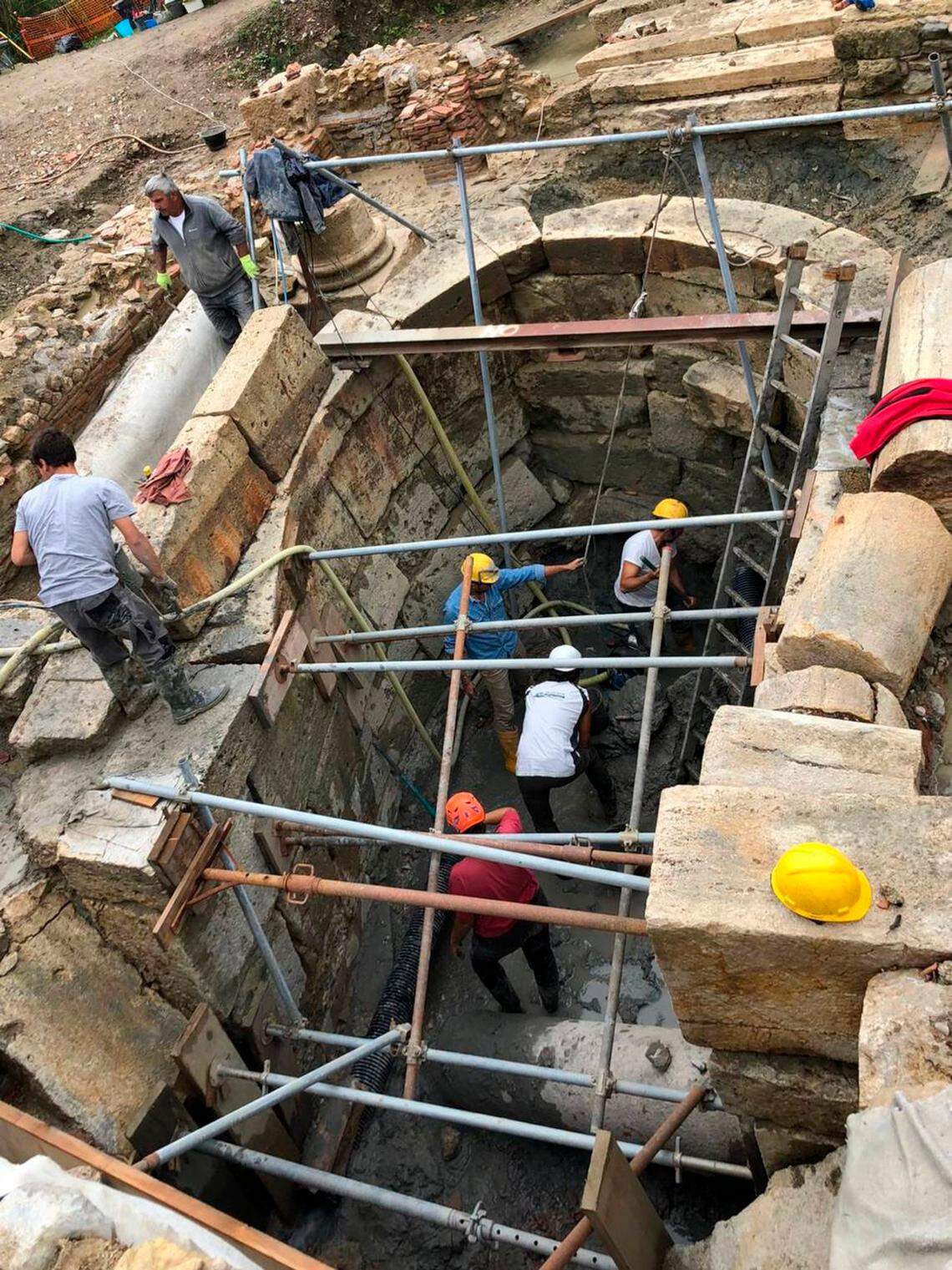 Archaeologists work at the ancient Tuscan thermal spring.