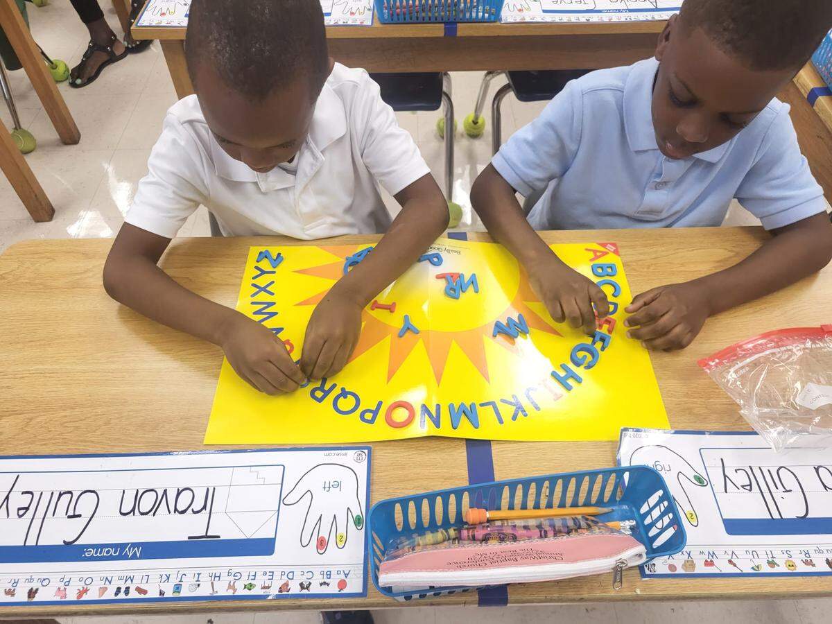 Kids at Norwood Elementary participating in reading activities with The Lucy Project.