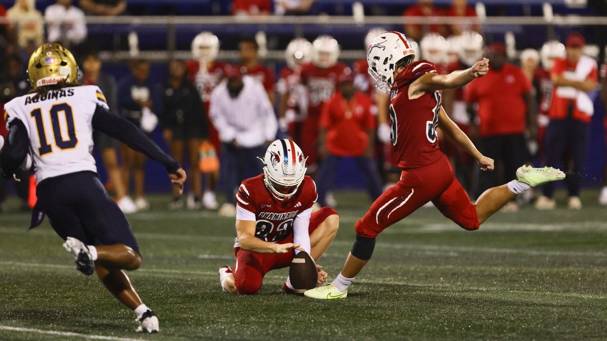 Chaminade-Madonna Lions kicker Noah Sidan (30) kicks an extra point against the St. Thomas Aquinas Raiders during the first quarter of a high school football game at Pitbull Stadium at Florida International University in Miami, Florida, Friday, October 11, 2024.