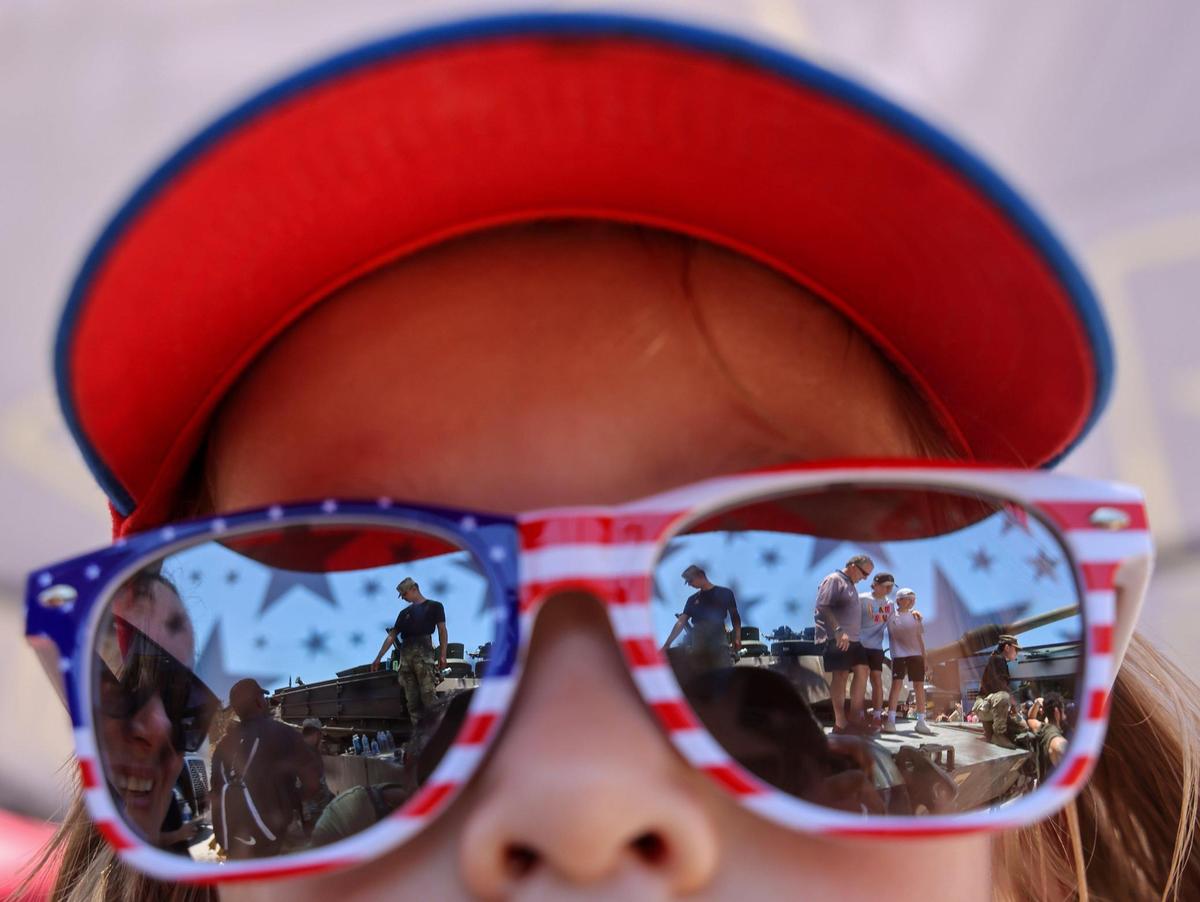 Liam Arias, 4, waits his turn to climb up the Army’s M-1 tank. On Sunday, May 28, 2023 the Hyundai Air & Sea Show returned to Miami Beach on Memorial Day Weekend (May 27, 2023 and May 28, 2023.) The event showcases the men, women, technology, and equipment from all five branches of the United States military as well as local police, firefighters, and their first responder agencies. The four block long Display Village that contains a Kid Zone, flight and navigation simulators, tactical training equipment, rifle range simulators, interactive displays from all five branches of the U.S. Military and the Monster Energy Action Zone which showcases a one-of-a-kind action-packed motocross performance by Keith Sayer’s FMX (Freestyle Motocross) demonstration team.