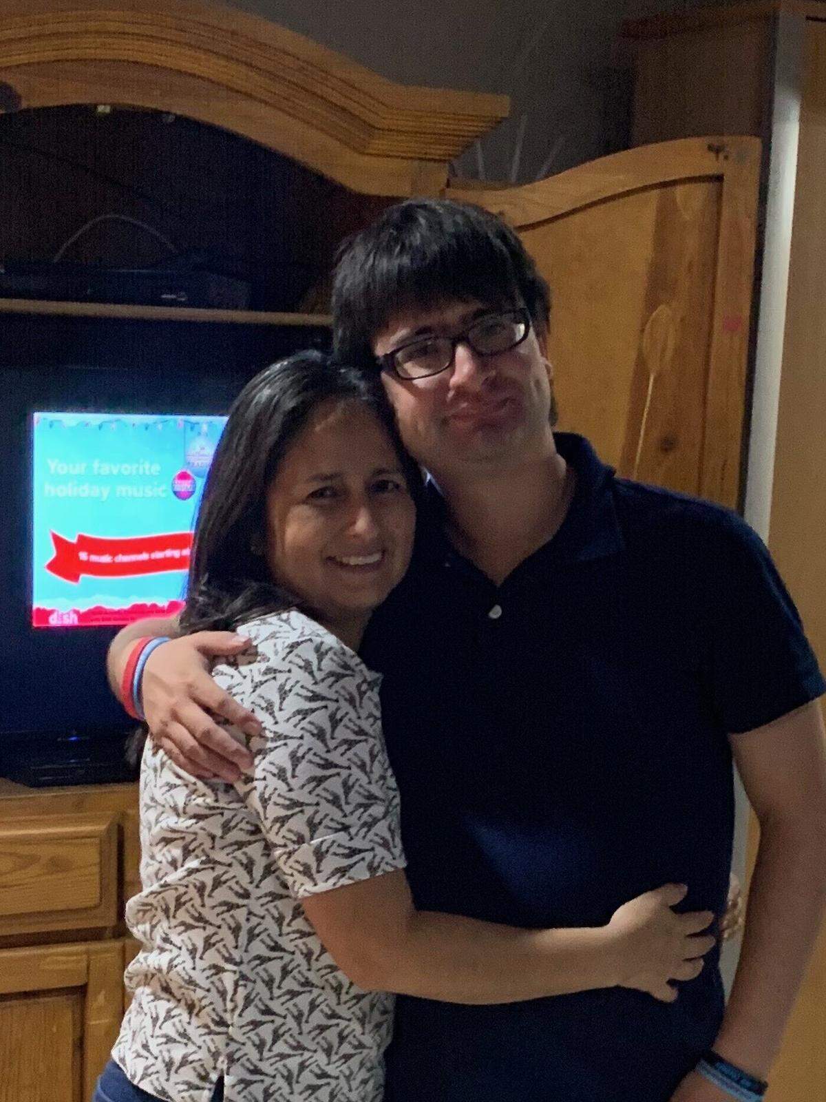 Giovana and Antonio Izzo at Antonio’s group home in December. The two haven’t seen each other since March because of the pandemic.