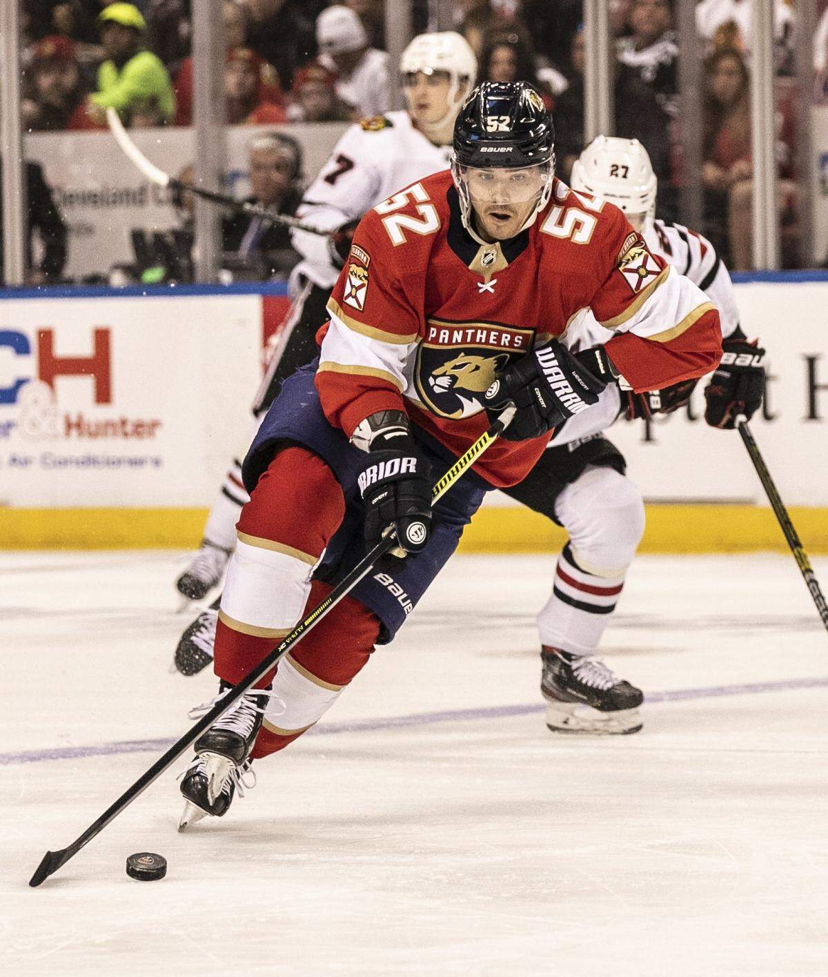 Florida Panthers defenseman MacKenzie Weegar (52) skates with the puck in the first period as the Florida Panthers host the Chicago Blackhawks at the BB&T Center in Sunrise on Saturday, February 29, 2020.