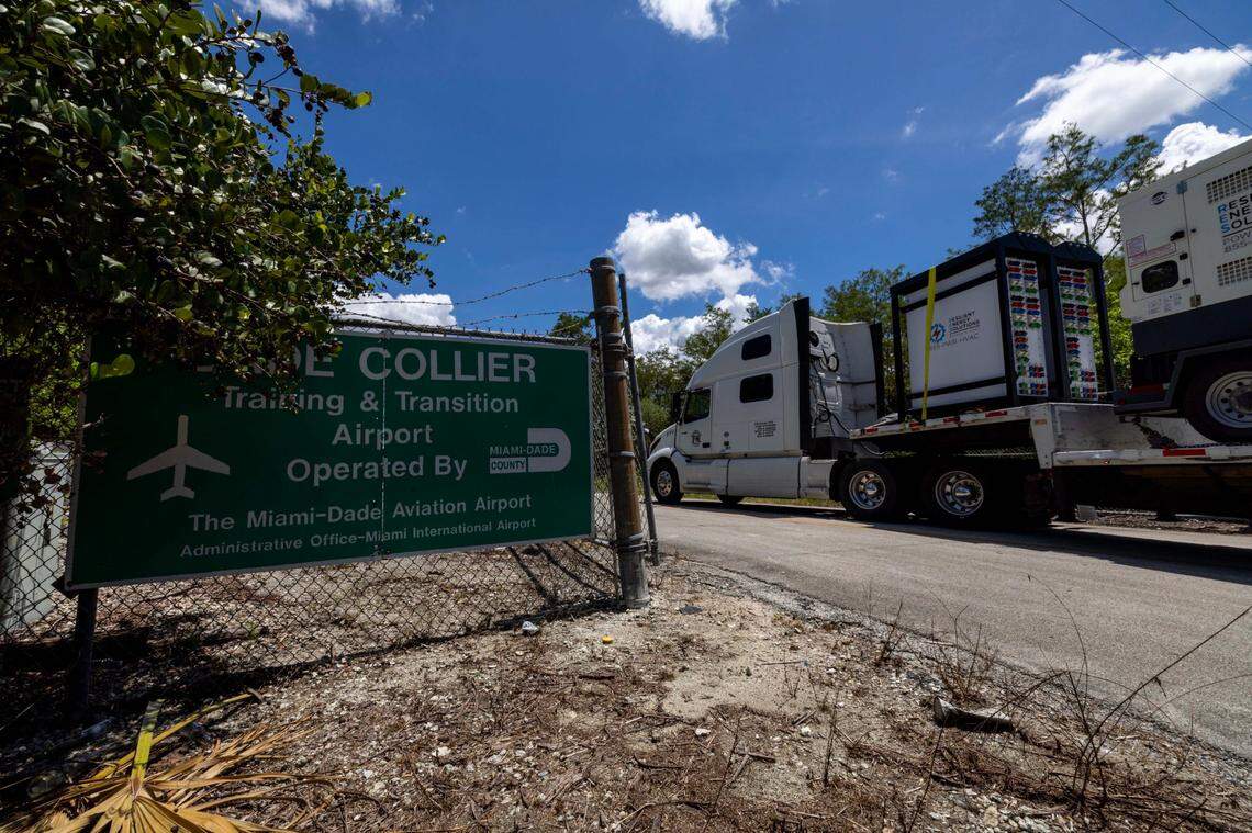 Heavy duty generators are driven into the new immigration detention center.