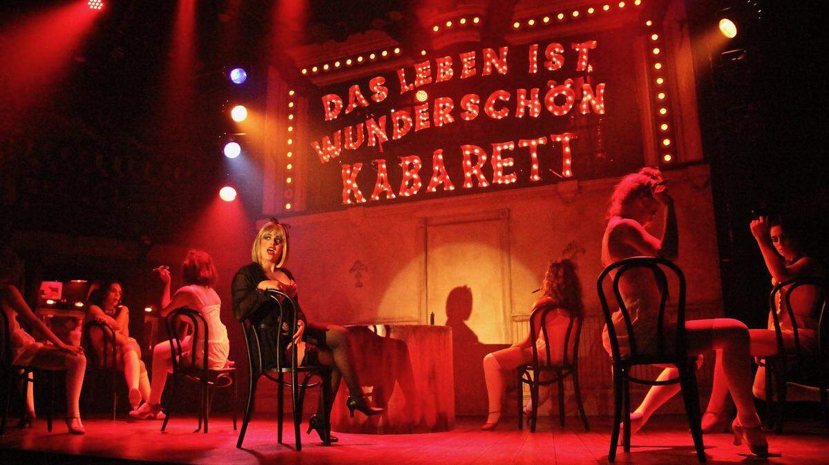 Marilyn Caserta as Sally Bowles does a number with the sultry, suggestive dancers in Area Stage’s “Cabaret.”